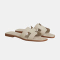 Claquettes H Beige